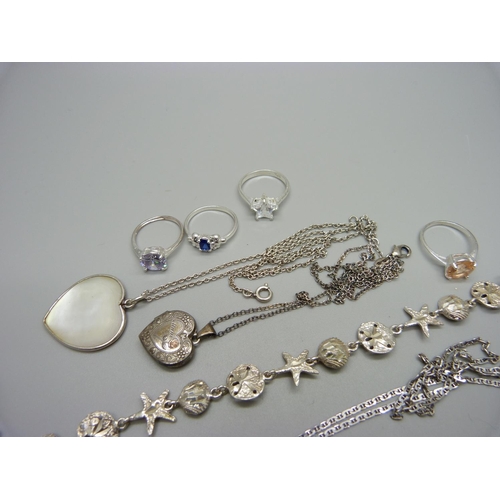 1013 - Four silver pendants and chains, a silver bracelet and silver rings