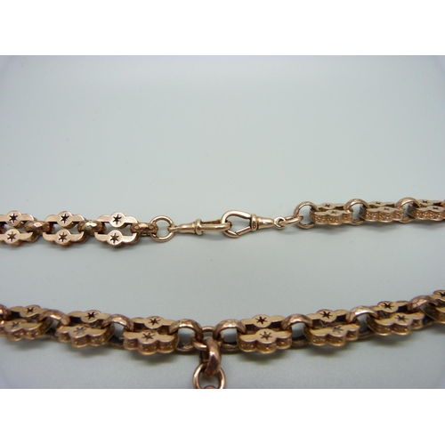 1017 - A 9ct rose gold fancy link double Albert chain, 55.5g, 51cm, (with an insurance valuation dated 1999... 