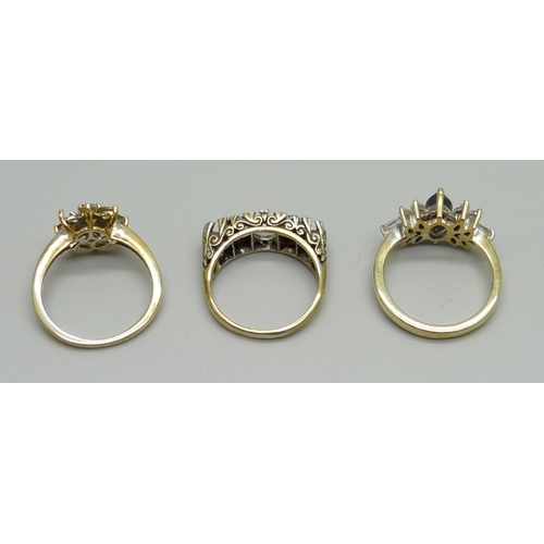 1041 - Three silver gilt rings, three lacking stones