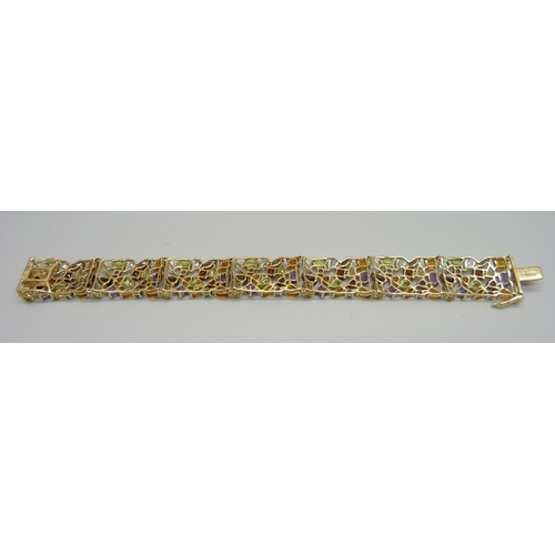 1049 - A 14ct gold and multi-gem set bracelet, 27.5g, 183mm x 17mm