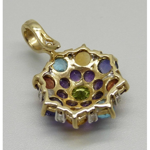 1063 - A 9ct gold and multi-gem set pendant, 3.4g, 17mm wide