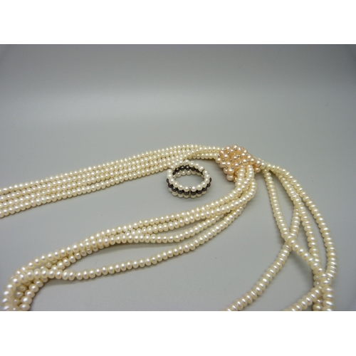 1065 - A freshwater pearl necklace, a multi-strand and adjustable pearl necklace and a ring