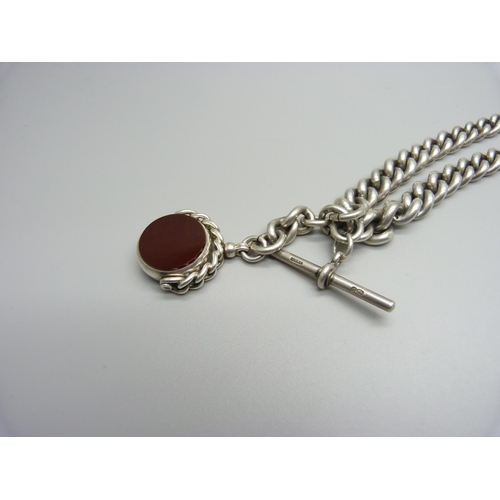 1075 - A silver double Albert watch chain with silver and carnelian/bloodstone fob, each graduated link mar... 