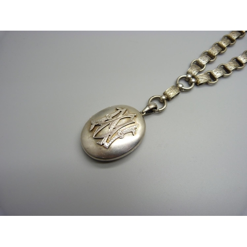 1076 - A Victorian white metal collar and locket, collar 41 cm