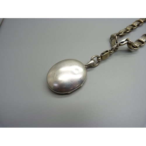 1076 - A Victorian white metal collar and locket, collar 41 cm