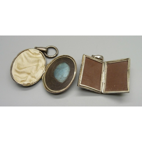 1078 - A hallmarked Victorian silver locket and an early 20th Century silver locket, (Victorian locket a/f,... 