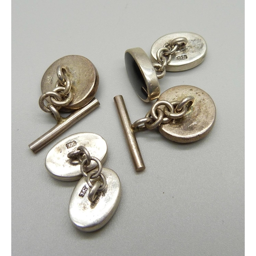 1079 - Two pairs of silver cufflinks including a pair of golfing cufflinks