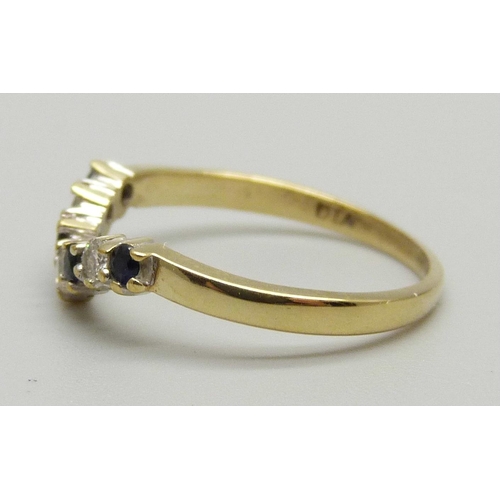 1085 - A 9ct gold sapphire and diamond wishbone ring, 1.4g, L