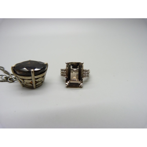 1088 - A silver and smoky quartz ring and a pendant and chain, ring size L