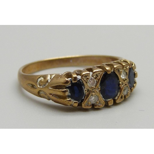 1093 - A 9ct gold sapphire and diamond ring, 2.3g, M