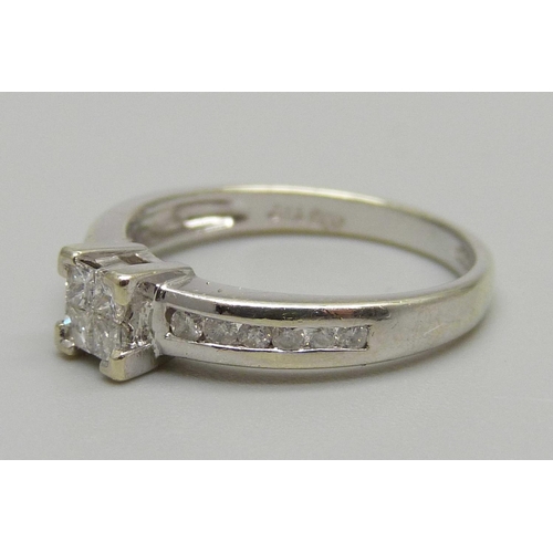 1105 - A 9ct gold and diamond ring, 2.4g, L