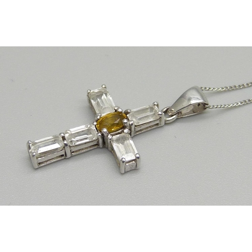 1106 - A 9ct white gold, white stone and citrine set cross pendant and chain, 3.2g