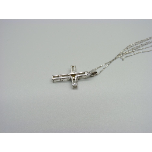 1106 - A 9ct white gold, white stone and citrine set cross pendant and chain, 3.2g