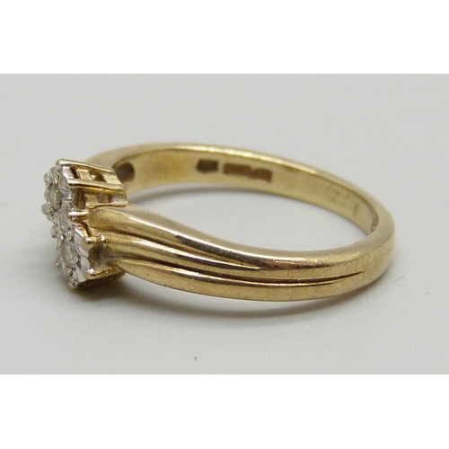 1115 - A 9ct gold and diamond crossover ring, 2.5g, K