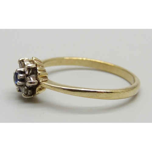 1137 - A 9ct gold, sapphire and diamond cluster ring, 1.6g, N