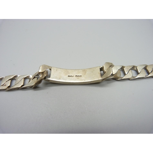 1159 - A silver curb chain ID bracelet, 50g