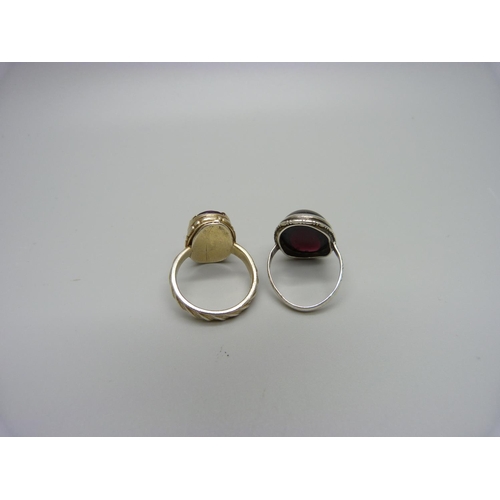 1171 - A silver and almandine garnet ring and a gilt metal amethyst ring, K and P