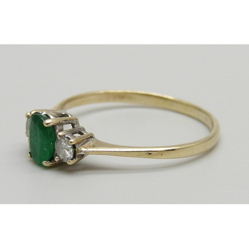 1184 - A 9ct gold diamond and emerald ring, 1.4g, Q