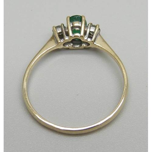 1184 - A 9ct gold diamond and emerald ring, 1.4g, Q