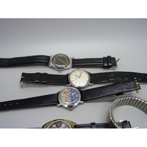 1196 - A collection of manual wind wristwatches and a case