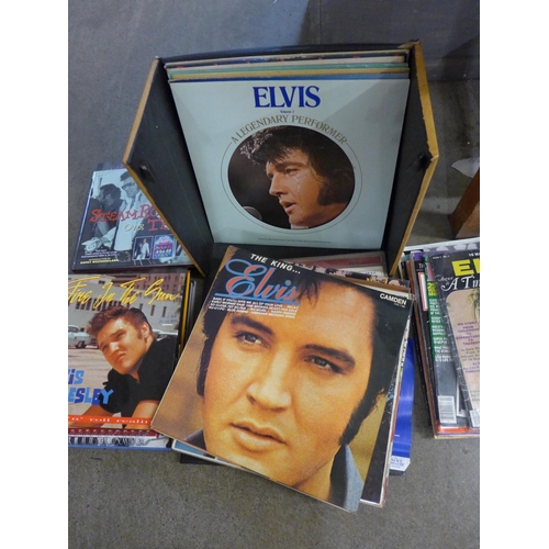 1216 - A case of Elvis Presley LP records and Elvis Presley books **PLEASE NOTE THIS LOT IS NOT ELIGIBLE FO... 