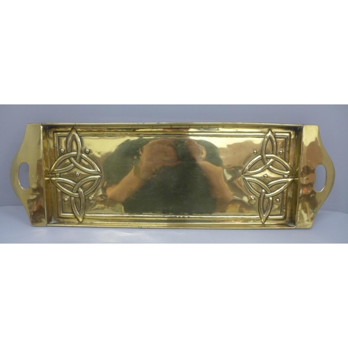 609 - An Art Nouveau brass tray, 52cm