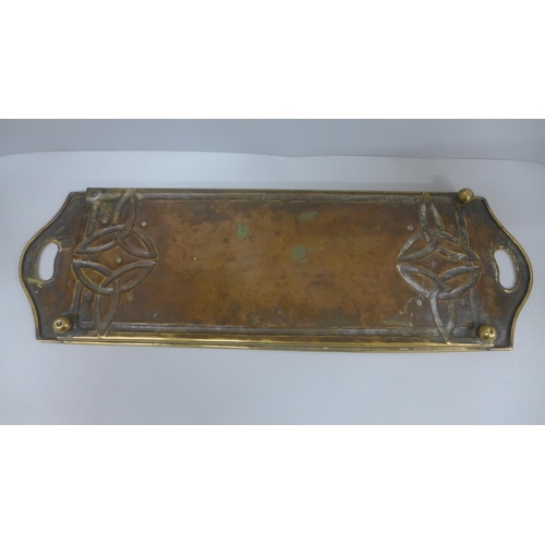 609 - An Art Nouveau brass tray, 52cm