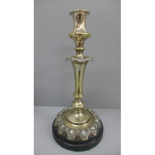 617 - A plated candlestick, 32.5cm