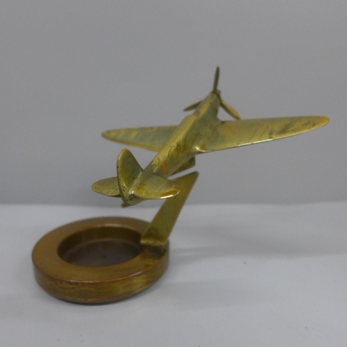 623 - A brass model of a Spitfire