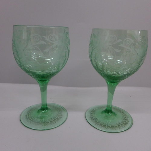 636 - A pair of green wine glasses, engraved with rococo design, circa 1880, possibly Austro-Hungarian