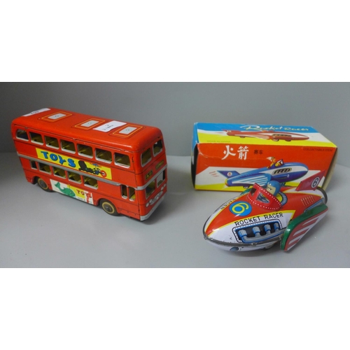 652 - Two Chinese tin-plate friction toys, Express Bus and Rocket Racer