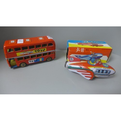 652 - Two Chinese tin-plate friction toys, Express Bus and Rocket Racer