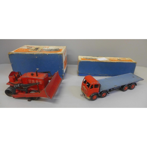 662 - Two Dinky Toys die-cast model vehicles, 561 Blaw Knox Bulldozer and 505 Foden Flat Truck, both boxed