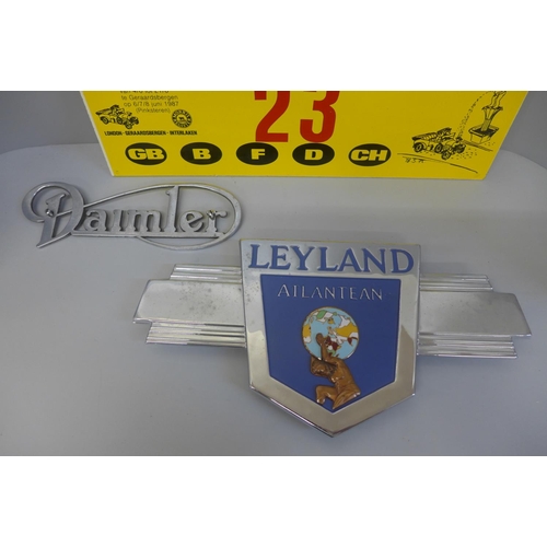 675 - A Daimler car badge, a Leyland Atlantean vehicle badge and a rally plate, 8th Manneken-Pis Rally, Lo... 