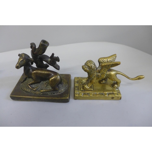 680 - A cast metal figure of a Borzoi, a/f and two brass figures, winged dog and lamb by a tree