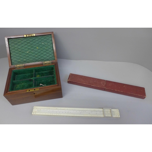 703 - A marquetry box, a candle box and a sliding rule