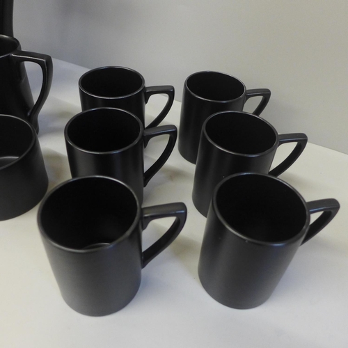 708 - A 1970's coffee set with coffee pot, milk jug, sugar bowl, six cups and six saucers