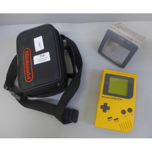 719 - A 1980s/90s Nintendo Game Boy with Tetris game and screen magnifier