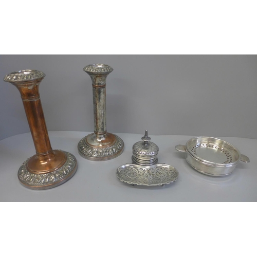 724 - A pair of circa 1830 cannon barrel candlesticks, a Mappin & Webb coaster and an inkwell