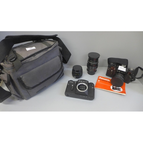 729 - A Zenit TTL camera with Pentacon auto 2.8/29 lens, a Zenit TTL camera body, a Pentacon 2.8/135 lens,... 