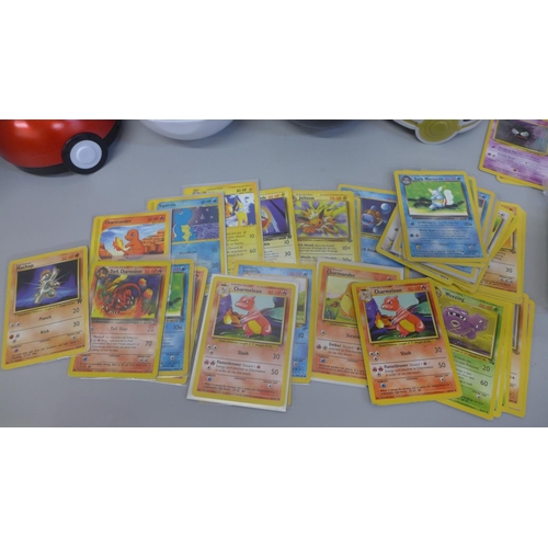 740 - Two Pokemon collectors tins containing cards including 55 trick or trade cards, 42 base set, Jungle,... 