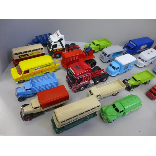 804 - A collection of Corgi and Dinky die-cast model vehicles, some re-sprayed and restored