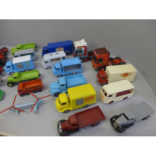 804 - A collection of Corgi and Dinky die-cast model vehicles, some re-sprayed and restored