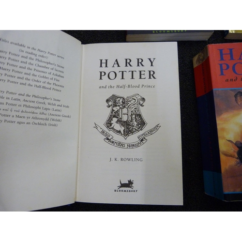 818 - Five Harry Potter novels including a first edition Half Blood Prince