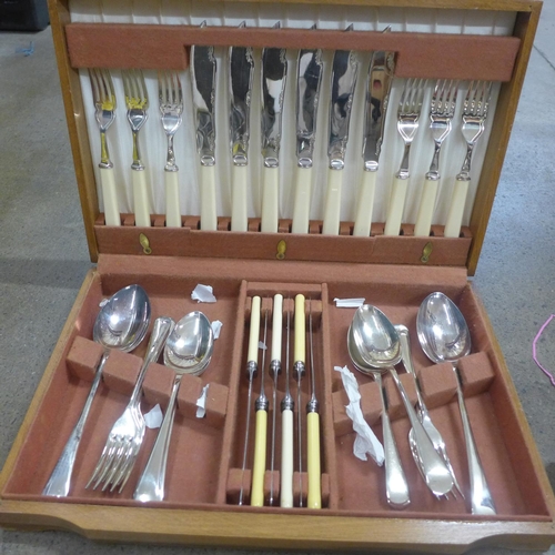 833 - Plated ware and a canteen of cutlery