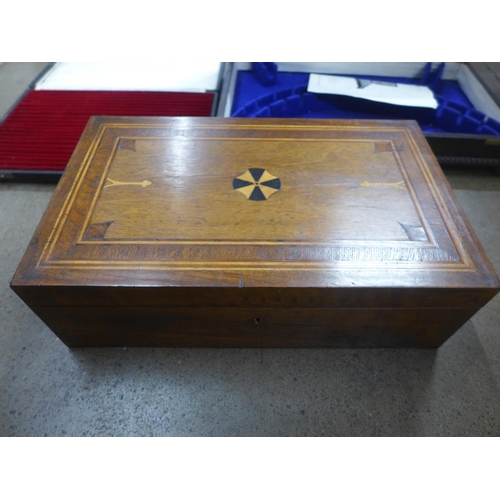 835 - A Victorian inlaid writing slope, a Georgian tea caddy and two cutlery cases