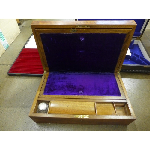 835 - A Victorian inlaid writing slope, a Georgian tea caddy and two cutlery cases