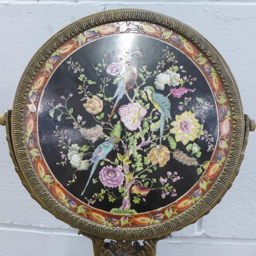 857 - A gilt metal and enamel chinoiserie toilet mirror