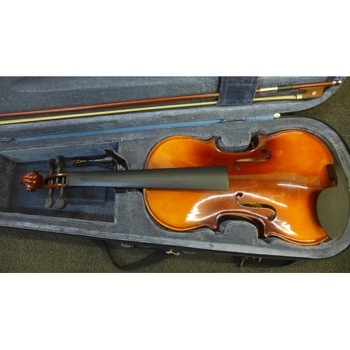 871 - A Stentor violin and bow, cased, requires stringing, a/f