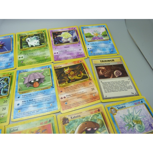 895 - A Collection of 1990's Pokemon cards; 20 Gym Heroes set including Koga's Beedrill holo and Misty's S... 